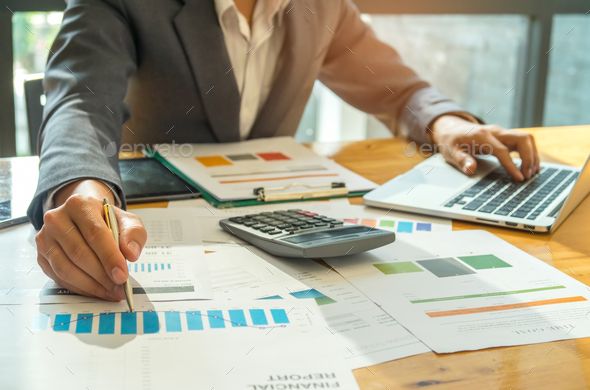 business concepts,businessmen analyzing graphs of data